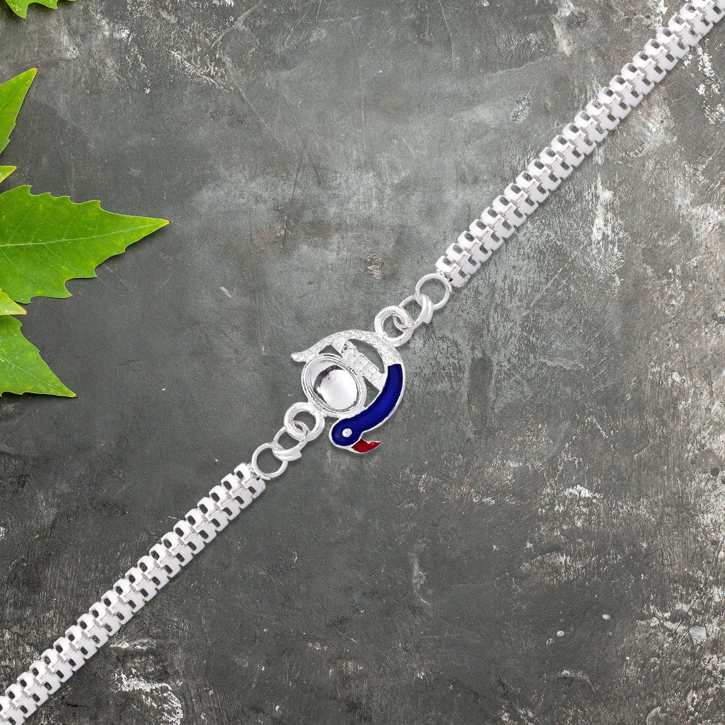 Elegant Peacock Design Rakhi with Blue Enamel and Silver Metal Chain
