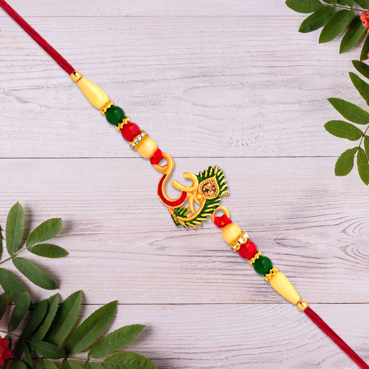 Om & Peacock feather Rakhi