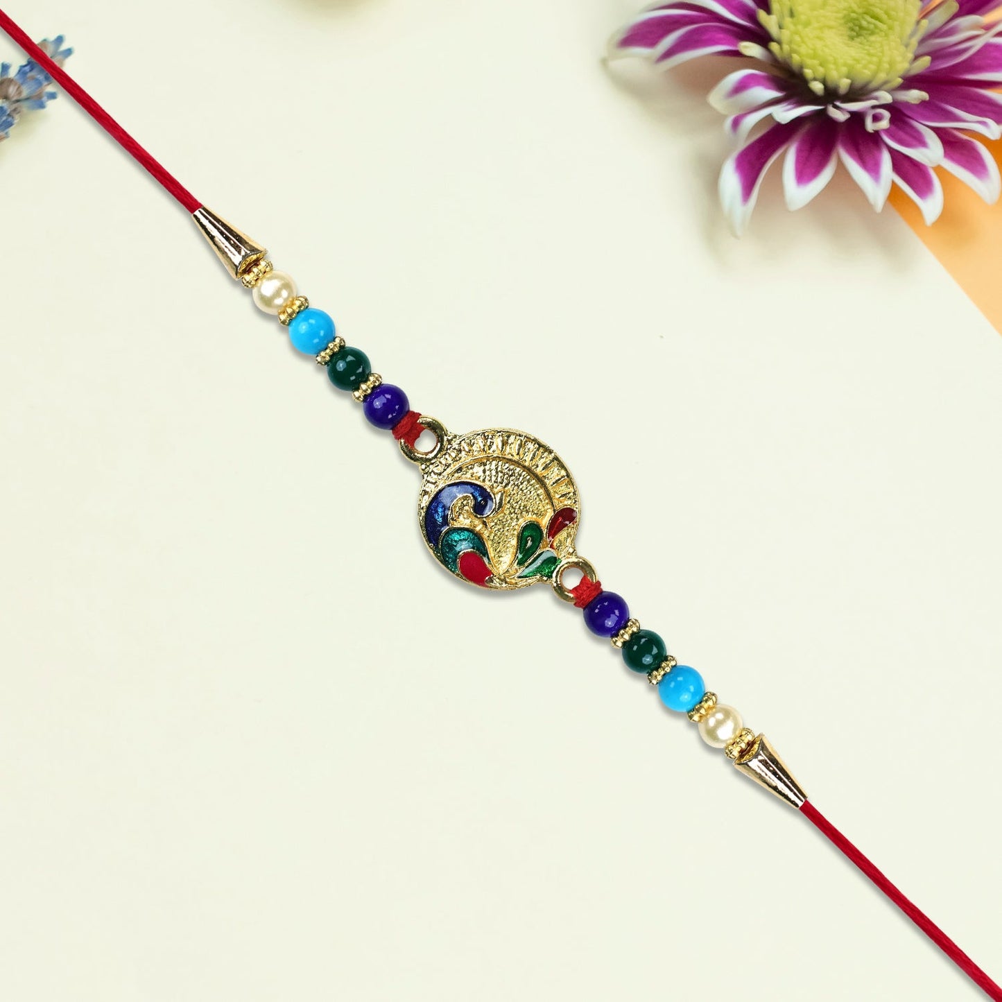 Circular Rakhi with Multicolor Beads and Gold Finish