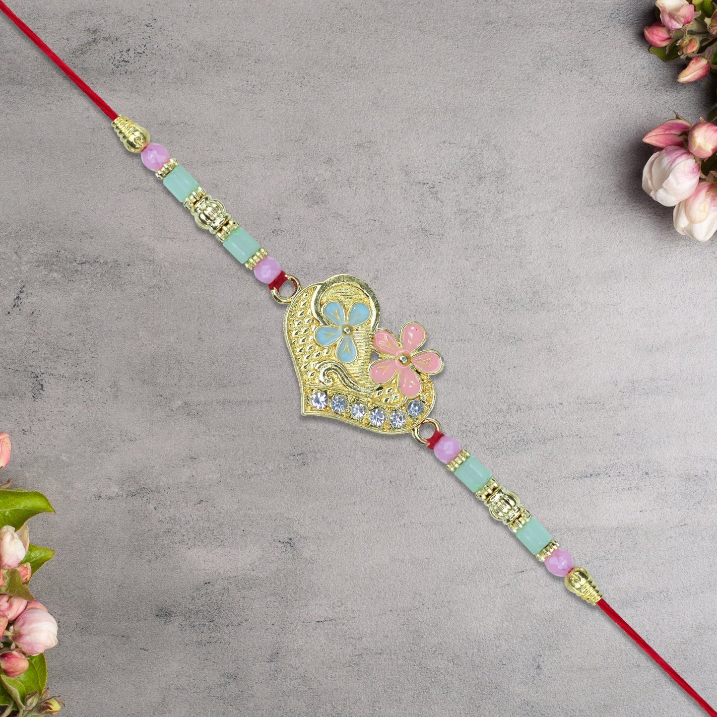 Heart-Shaped Rakhi with Pastel Floral Detailing