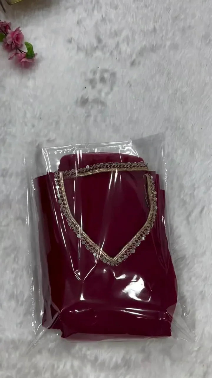 Deep Maroon Full-Flare Anarkali Gown Featuring a Sleeveless Design, Sparkling Metallic Scalloped Neckline Trim, Back Dori Tie-Up Detail, and a Dazzling Side-Seam Embellished Border