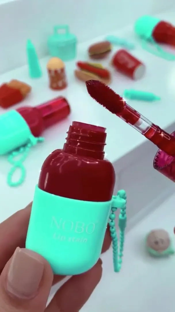 Capsule Lip Stain Keychain: Cherry Red Liquid Lip Color in a Unique Mint Green Pill-Shaped Travel Applicator