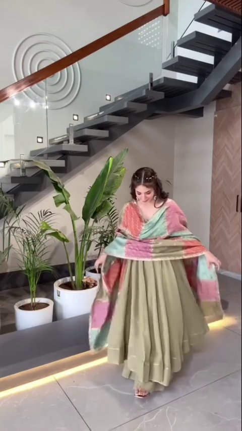 Olive Green Anarkali Dress with Multicolor Floral Dupatta – Elegant Traditional Wear for Weddings, Festive Occasions, and Cultural Celebrations.