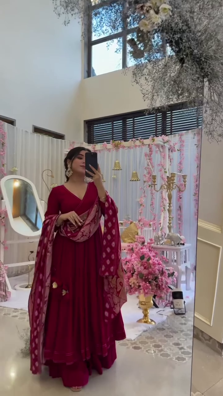 Beautiful Maroon Anarkali Dress with Elegant Printed Dupatta – Perfect for Weddings, Festive Celebrations, and Traditional Occasions. Featuring a Flowing Silhouette and Timeless Style.