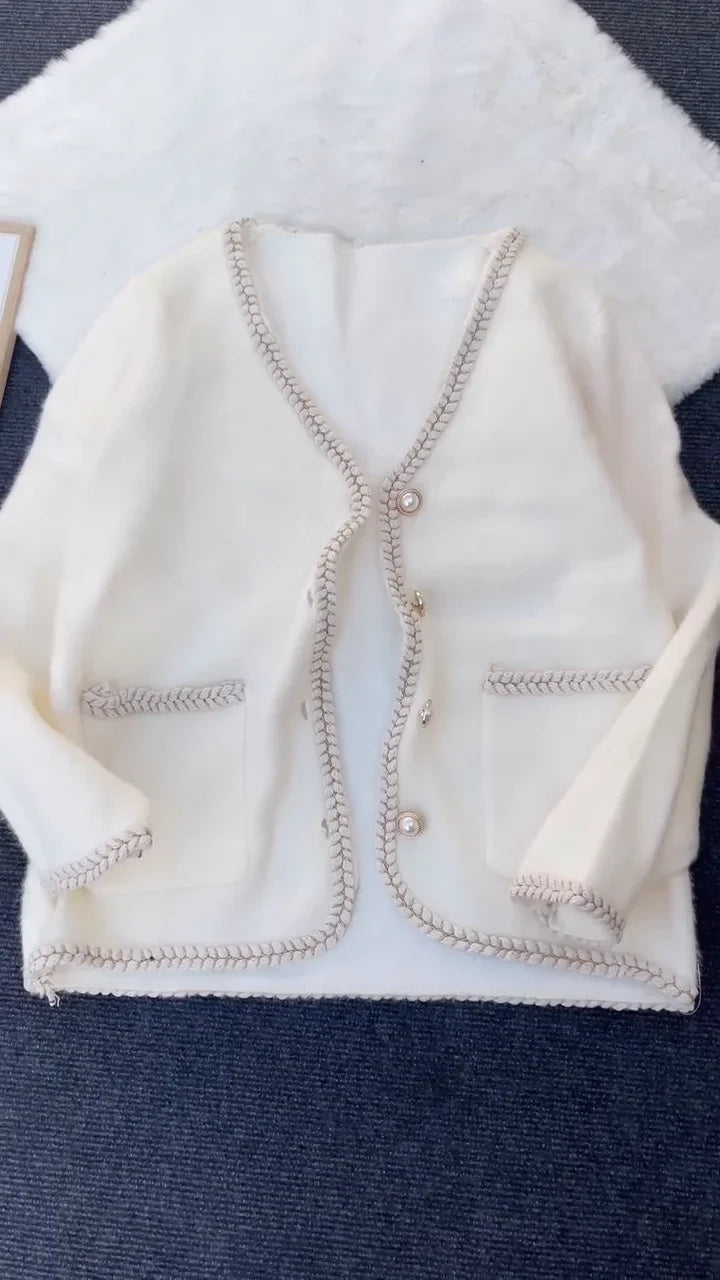 Elegant Long Knitted Cardigan with Pearl Buttons and Braided Trim – Classic Cream Winter Wear