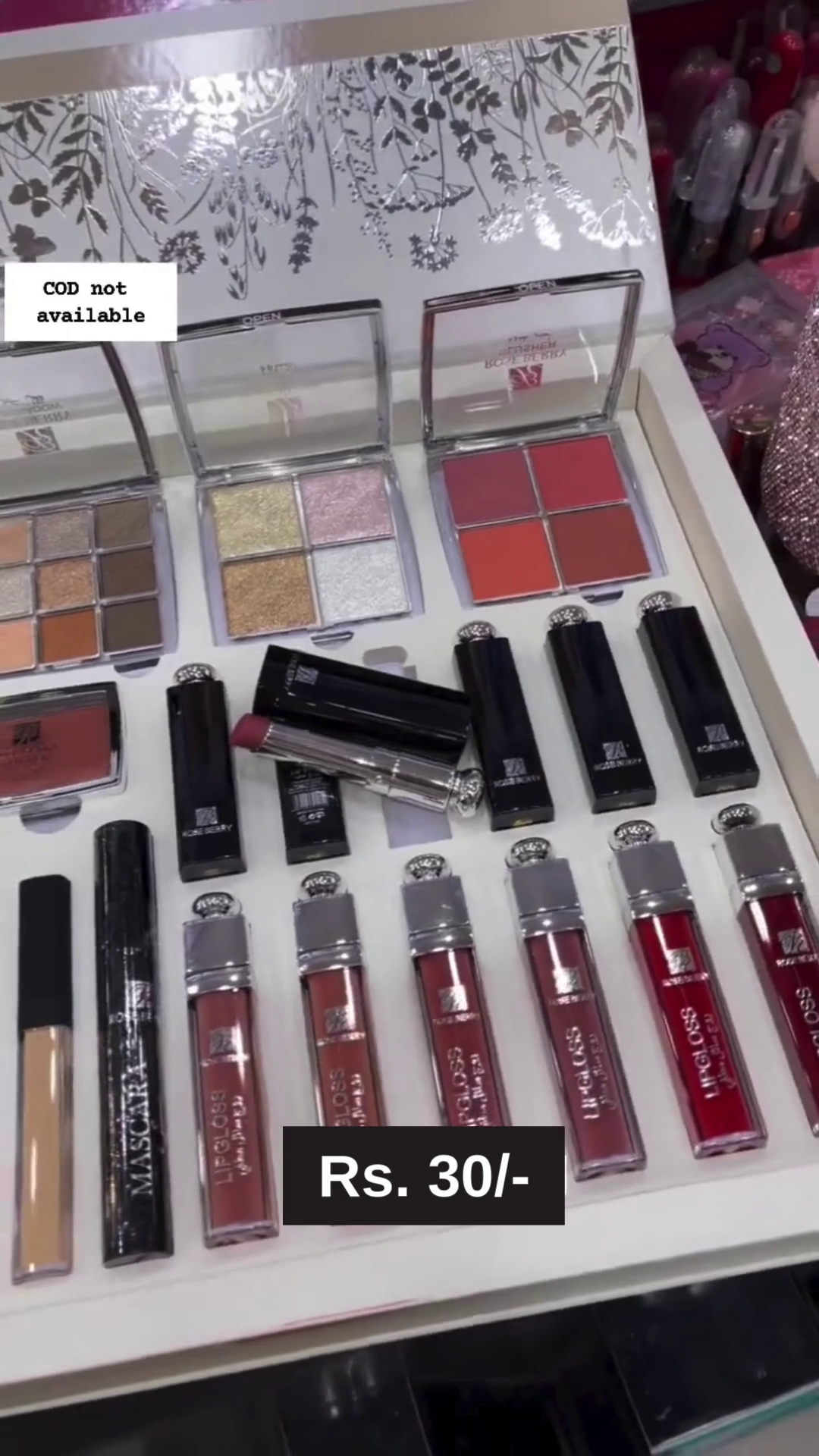 Complete Professional Makeup Kit Featuring Eyeshadow Palettes, Lipsticks, Glosses, Blush, Foundation, Eyeliner, Concealer, and More in a Stylish Floral Box Packaging