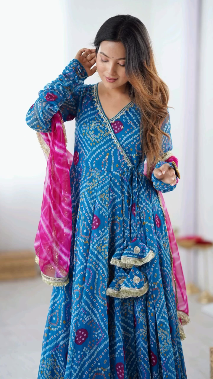 Blue Bandhani Printed Anarkali Set with Full Sleeves, Tassel Detailing, and Contrasting Pink Tie-Dye Dupatta with Golden Border – A Perfect Traditional Ensemble for Festive and Cultural Occasions