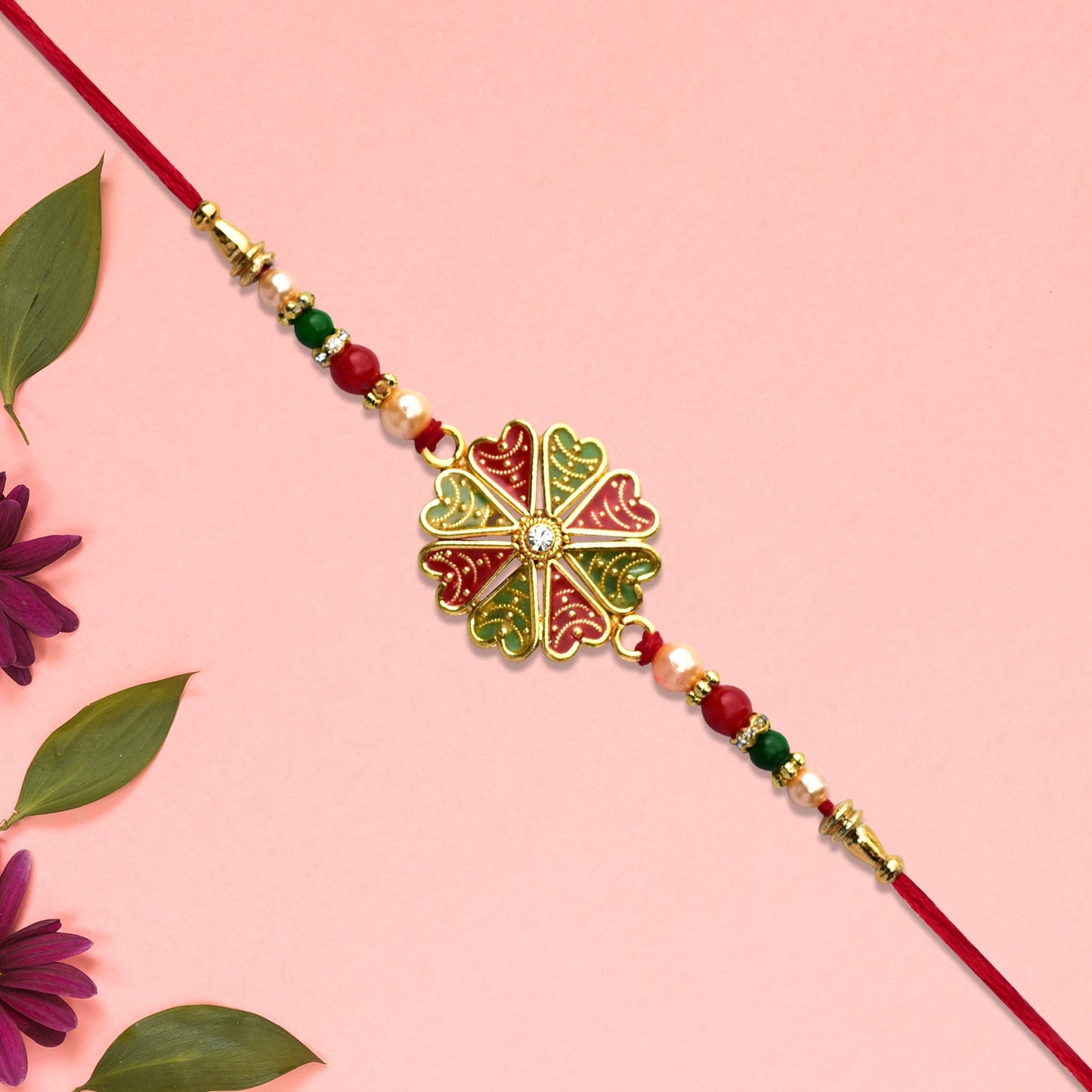 Traditional Rakhi with Bright Floral Centerpiece and Decorative Thread