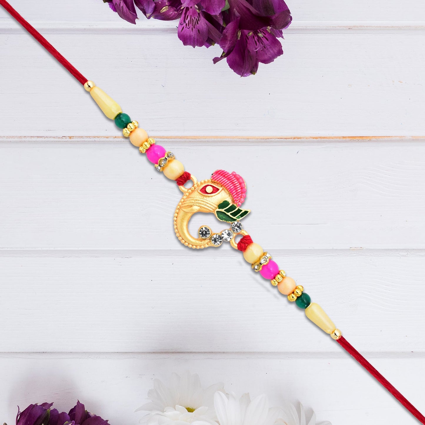 Stylish Ganesh Design Rakhi with Multicolor Beads and Gold Finish Accents