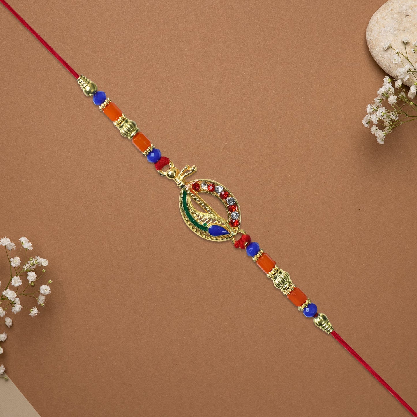 Traditional Dagger Rakhi with Colorful Beads and Stones
