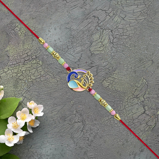 Elegant Conch Shell Rakhi with Enamel Detailing and Beads