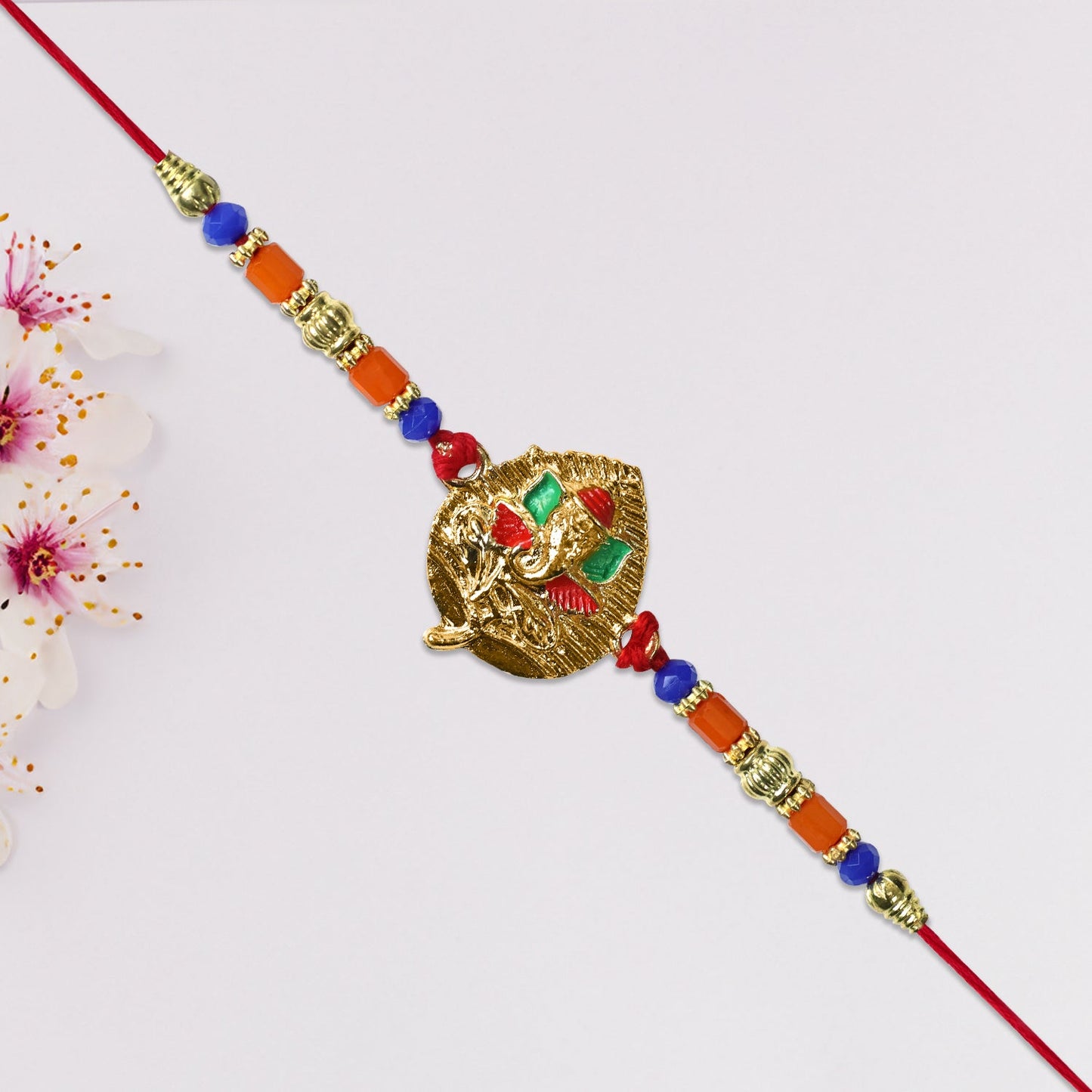 Ganesh Leaf Motif Rakhi with Colorful Beads