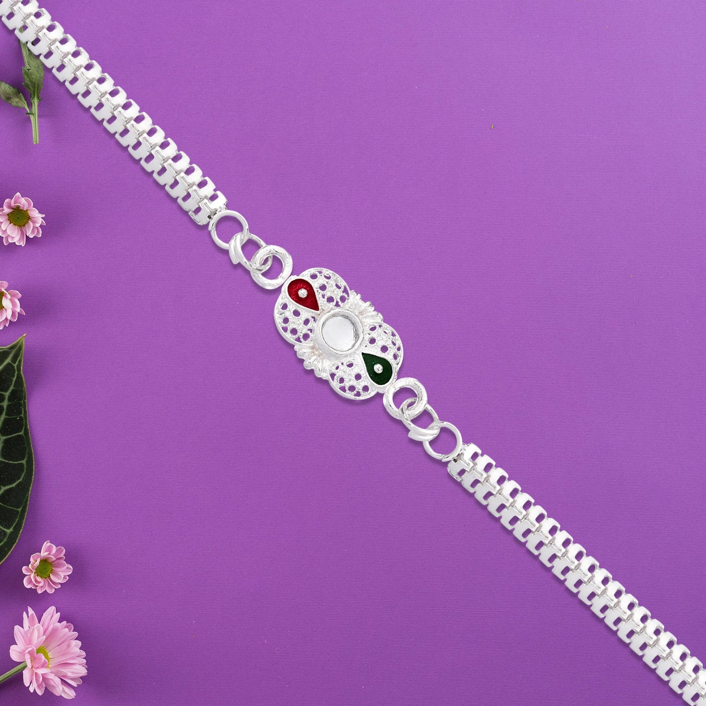 Elegant Silver Rakhi with Red-Green Enamel Accents and Central Mirror Stone