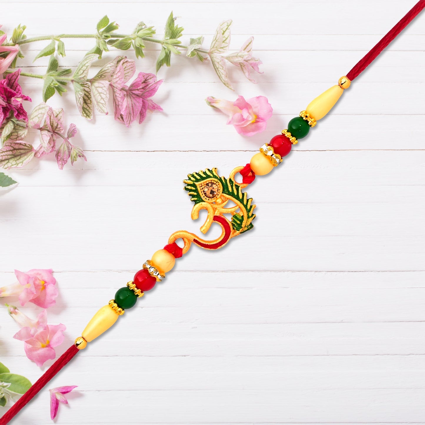 Om & Peacock feather Rakhi