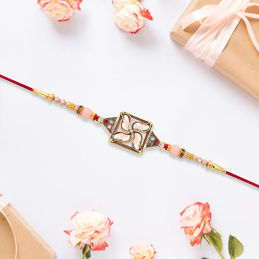 Designer Rakhi with Swastik-Inspired Kundan Dial and Decorative Beads