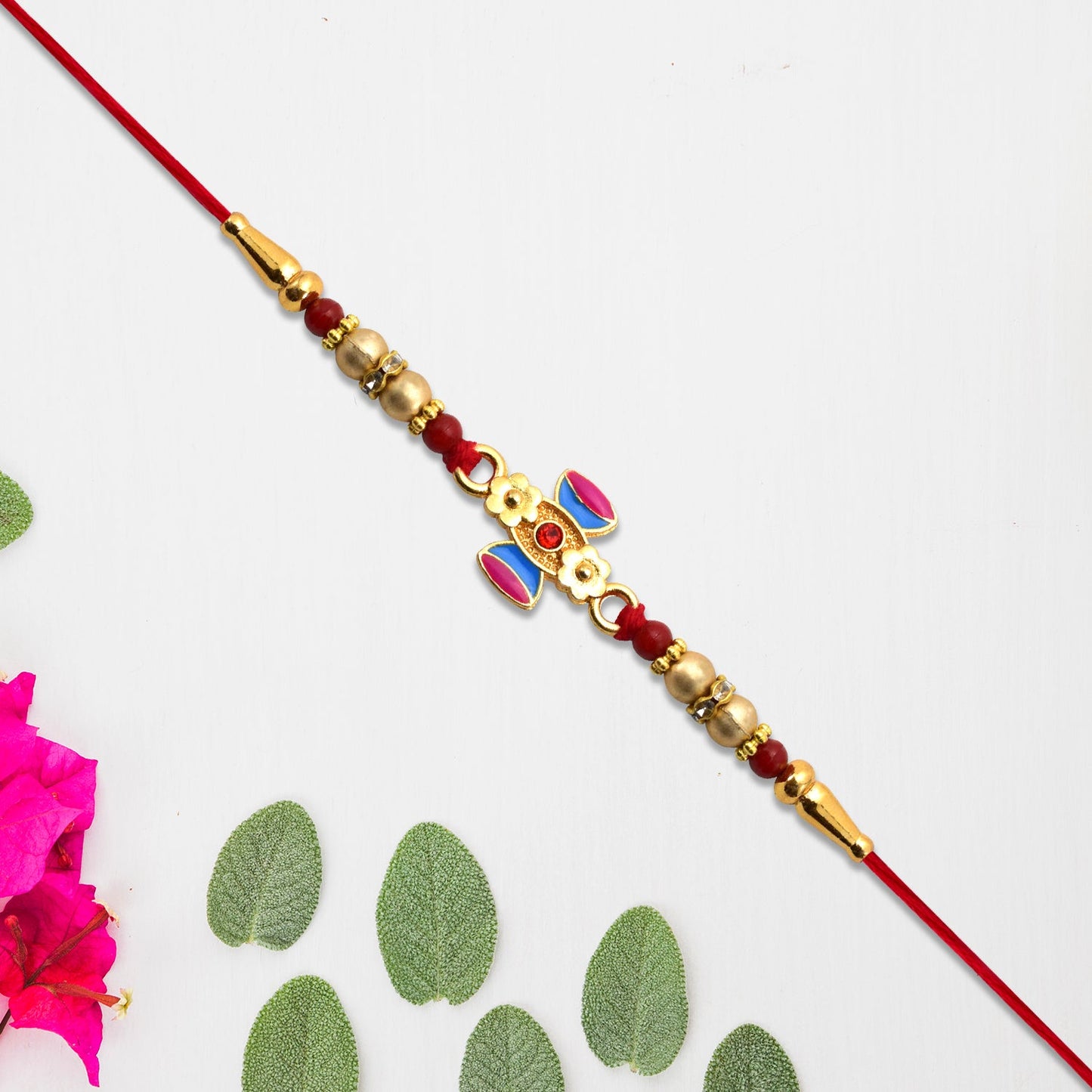 Damru Rakhi with Beads and Floral Detailing