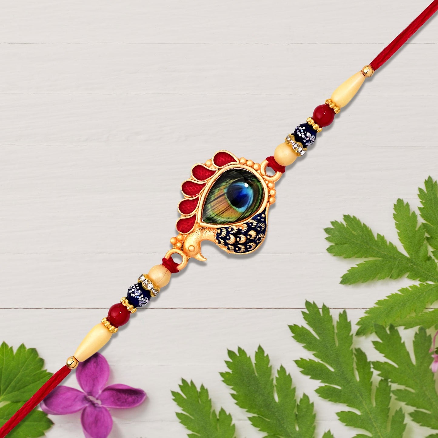 Peacock feathers rakhi