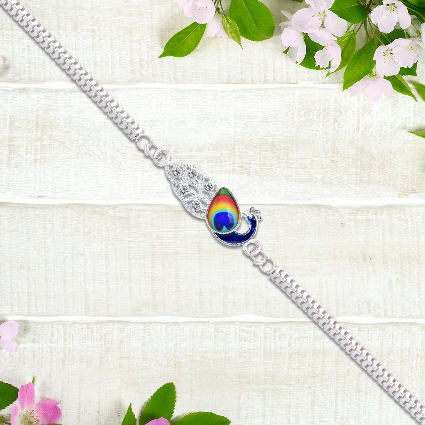 Elegant Silver Peacock Rakhi with Tricolor Enamel – Designer Rakhi for Brother