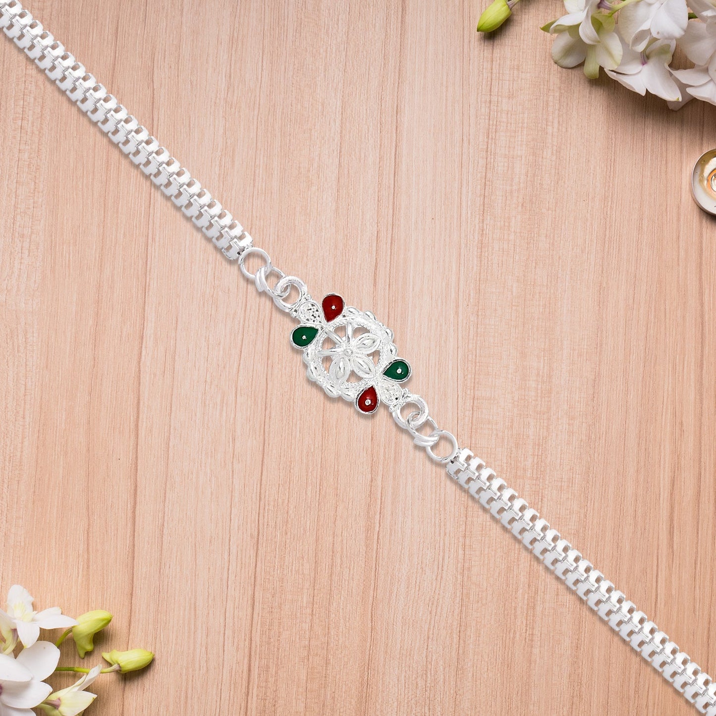 Delicate Metal Chain Rakhi with Enamel Floral Center