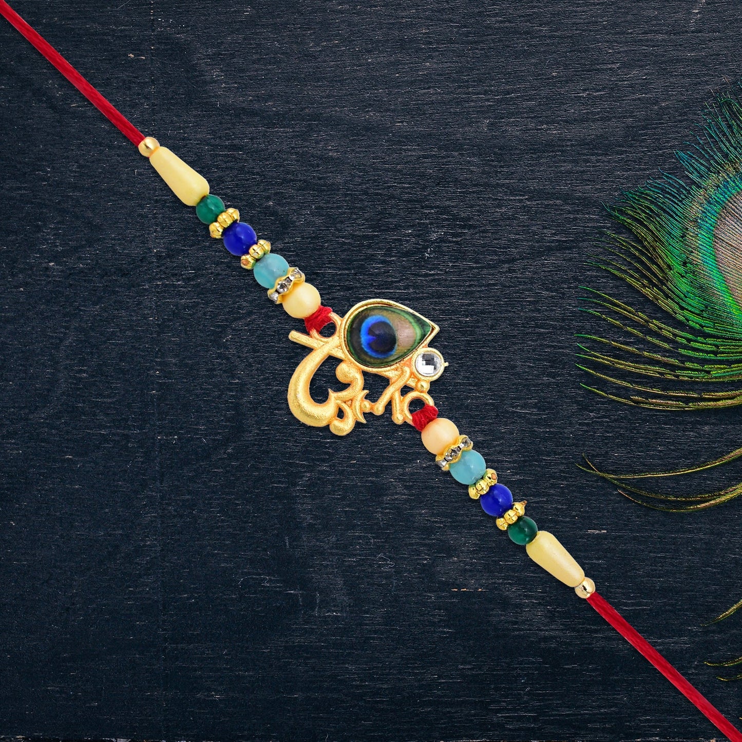 Divine Govind Rakhi with Peacock Feather Design and Multicolor Beads