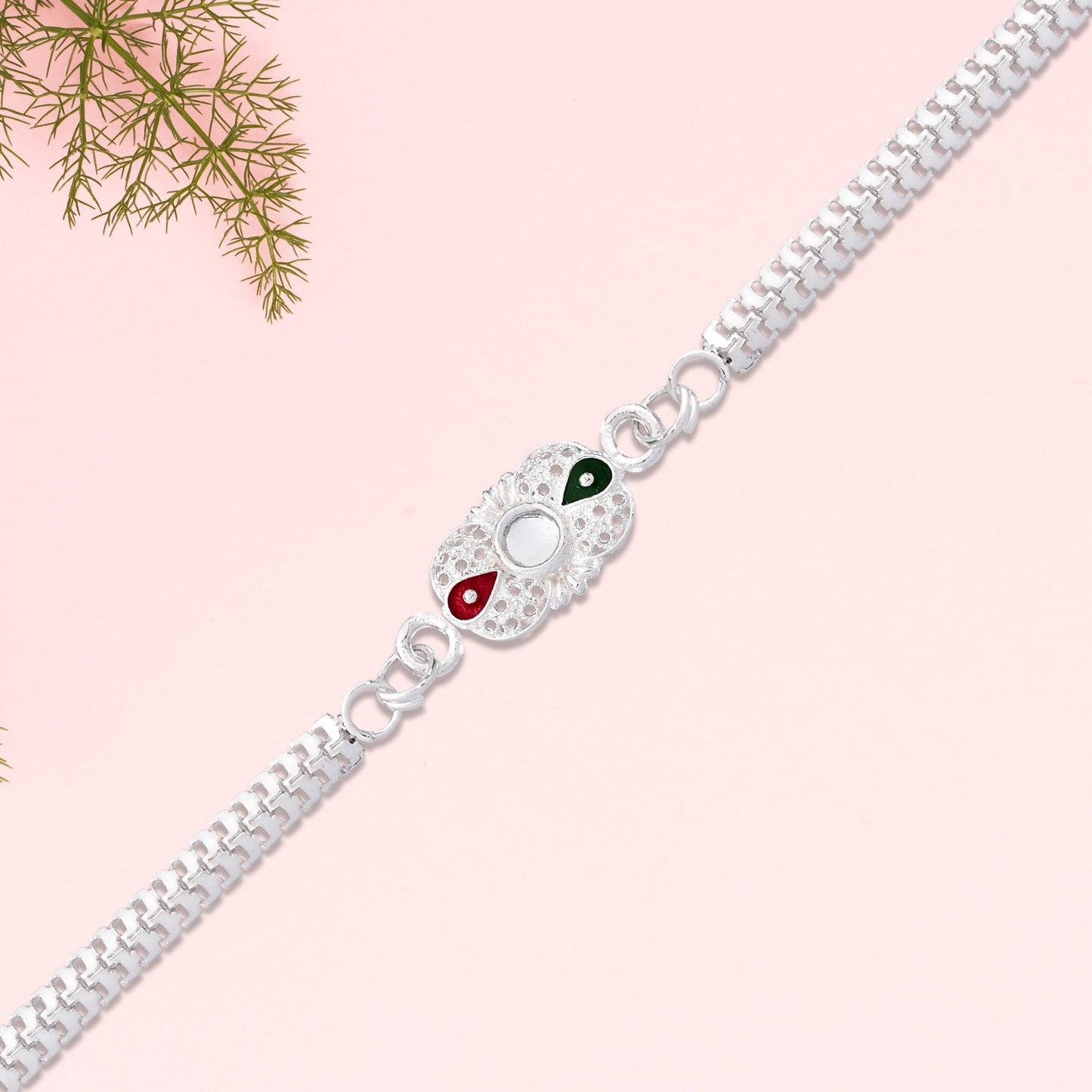 Elegant Silver Rakhi with Red-Green Enamel Accents and Central Mirror Stone