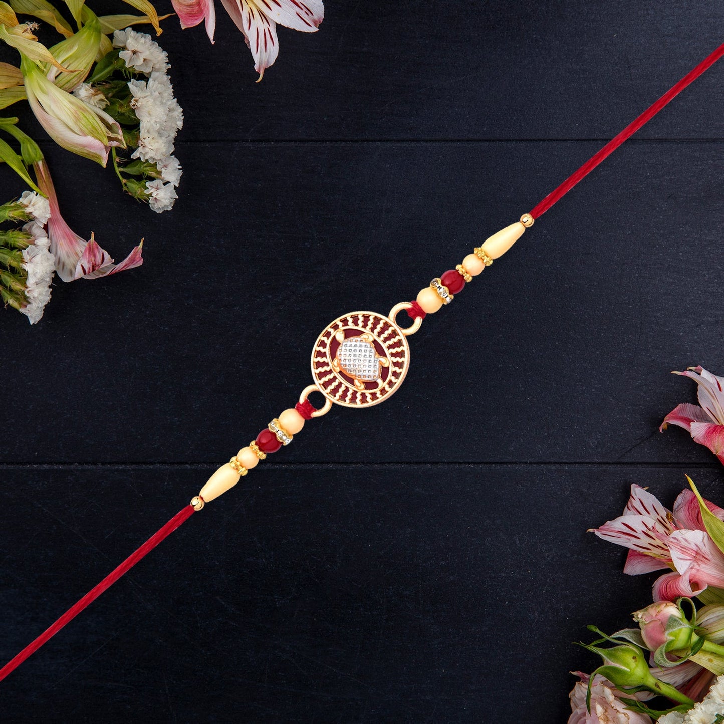 Designer Turtle Rakhi with Beaded Red Thread