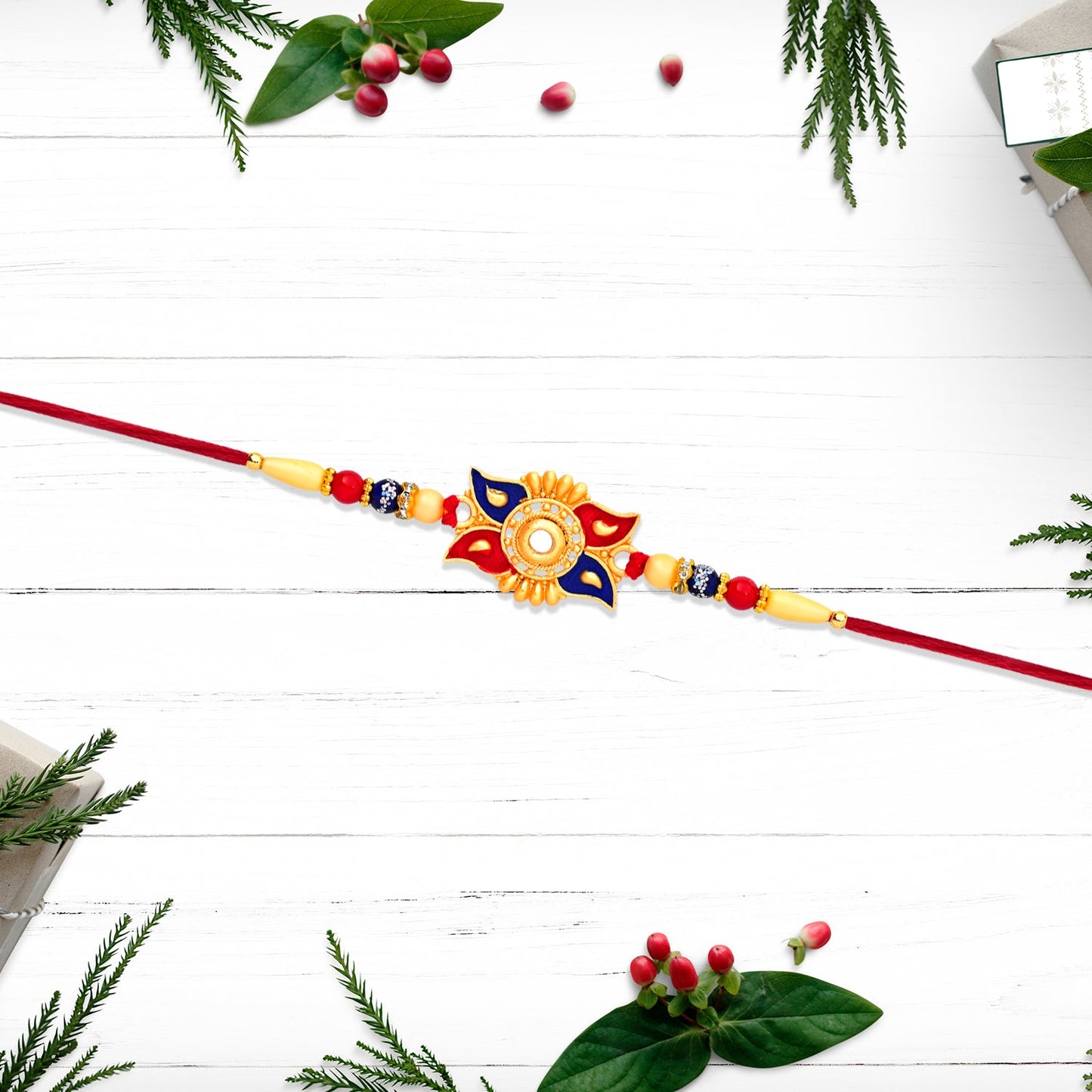 Designer Sun Motif Rakhi with Red and Blue Enamel Work