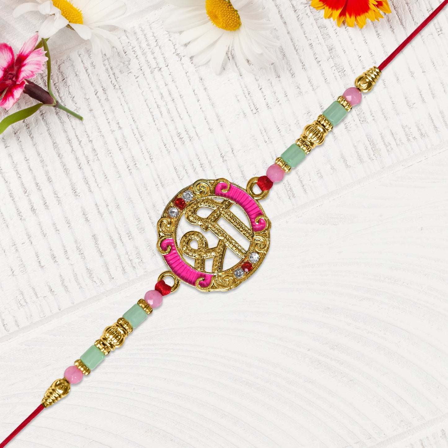 Shree Round Designer Rakhi with Pink Accents