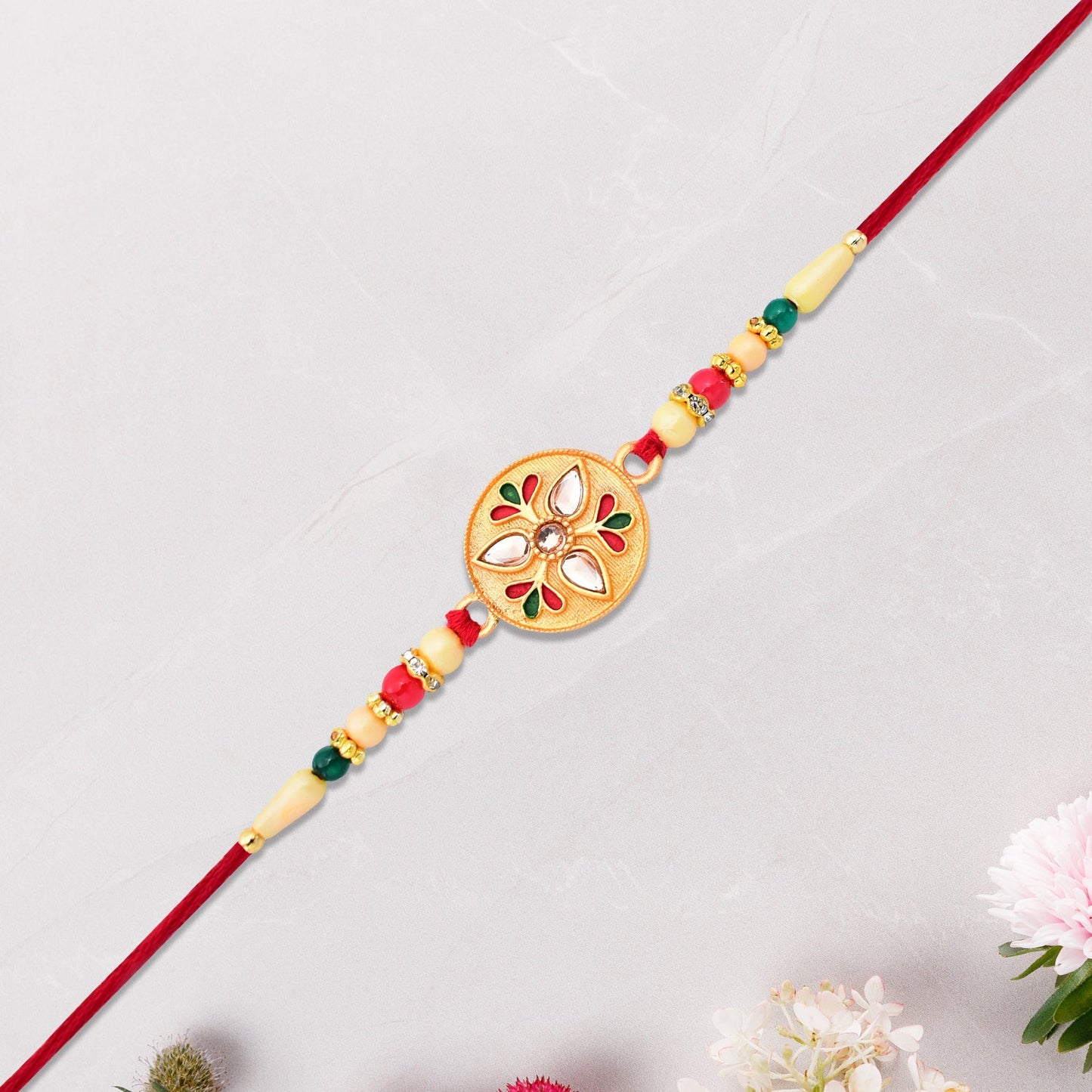 Sacred Kalash Design Rakhi with Embellished Beads and Red Thread