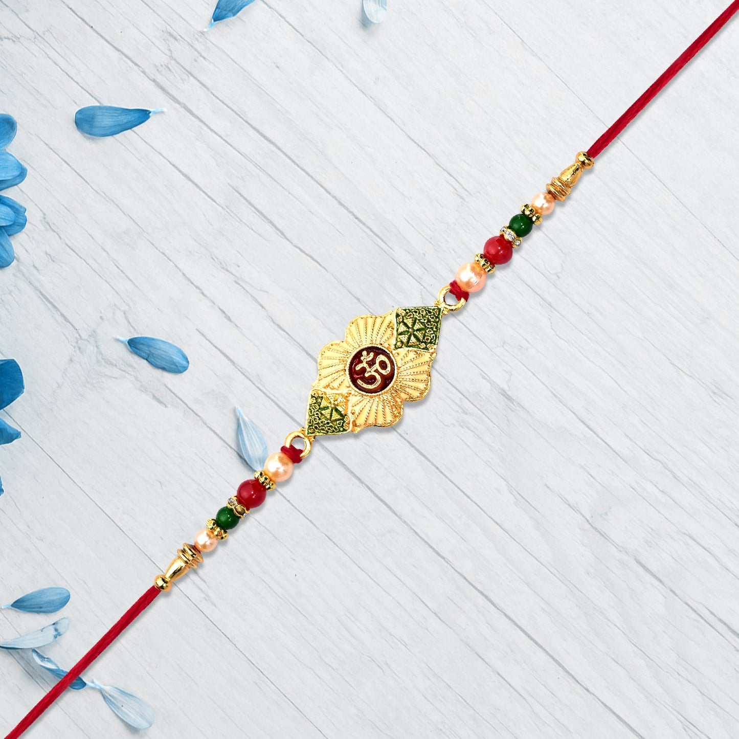 Divine Ganpati Rakhi with Enamel Work and Traditional Beads