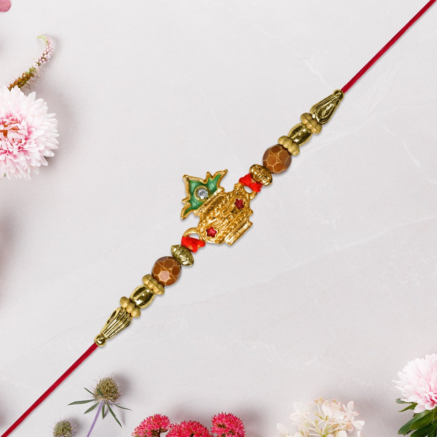 Designer Rakhi with Golden Kalash Motif