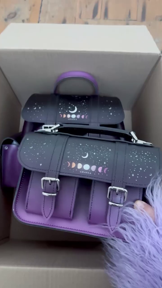 Galaxy-Inspired Purple Leather Satchel with Moon Phases Design and Adjustable Strap Bag