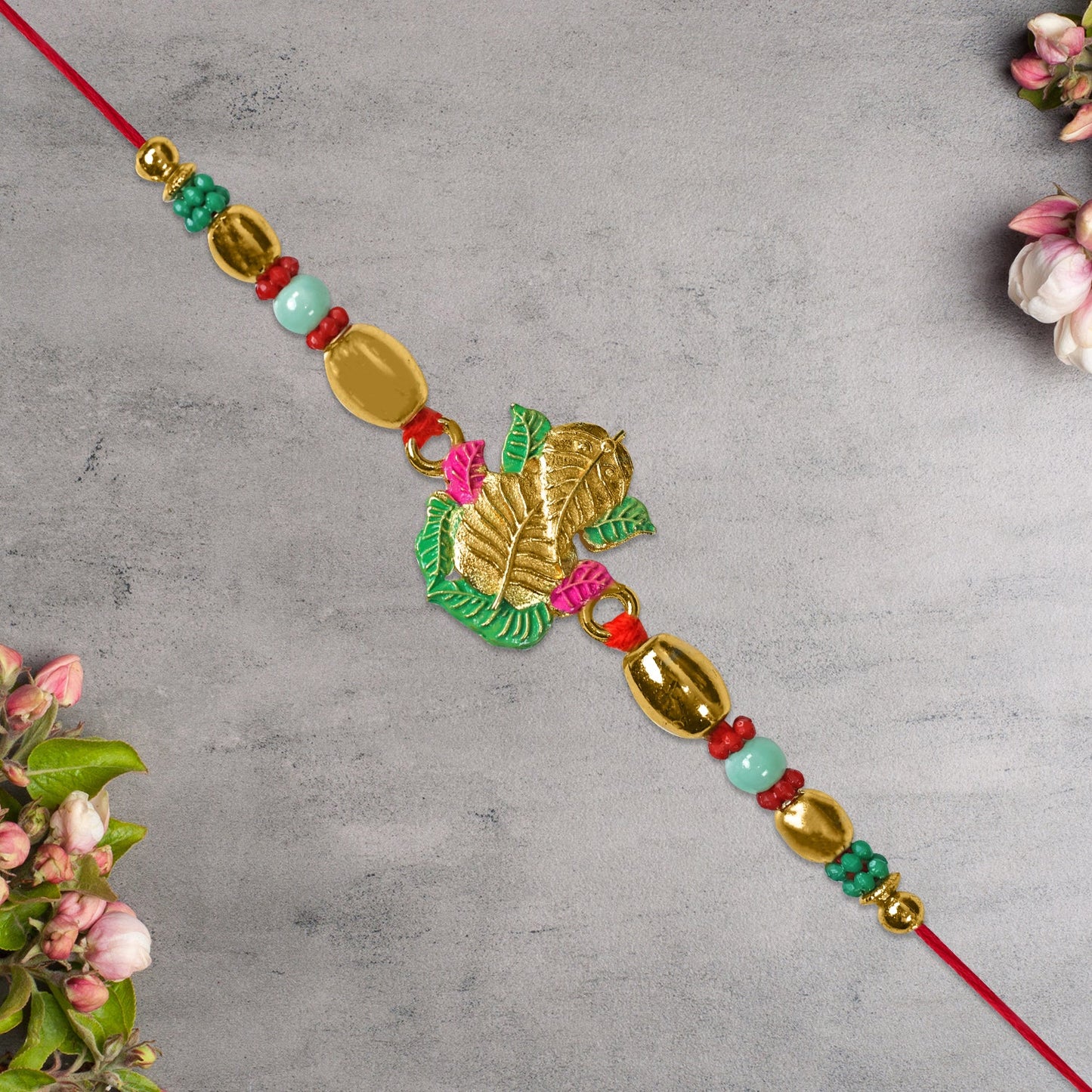 Golden Leaf Design Rakhi with Multicolor Beads