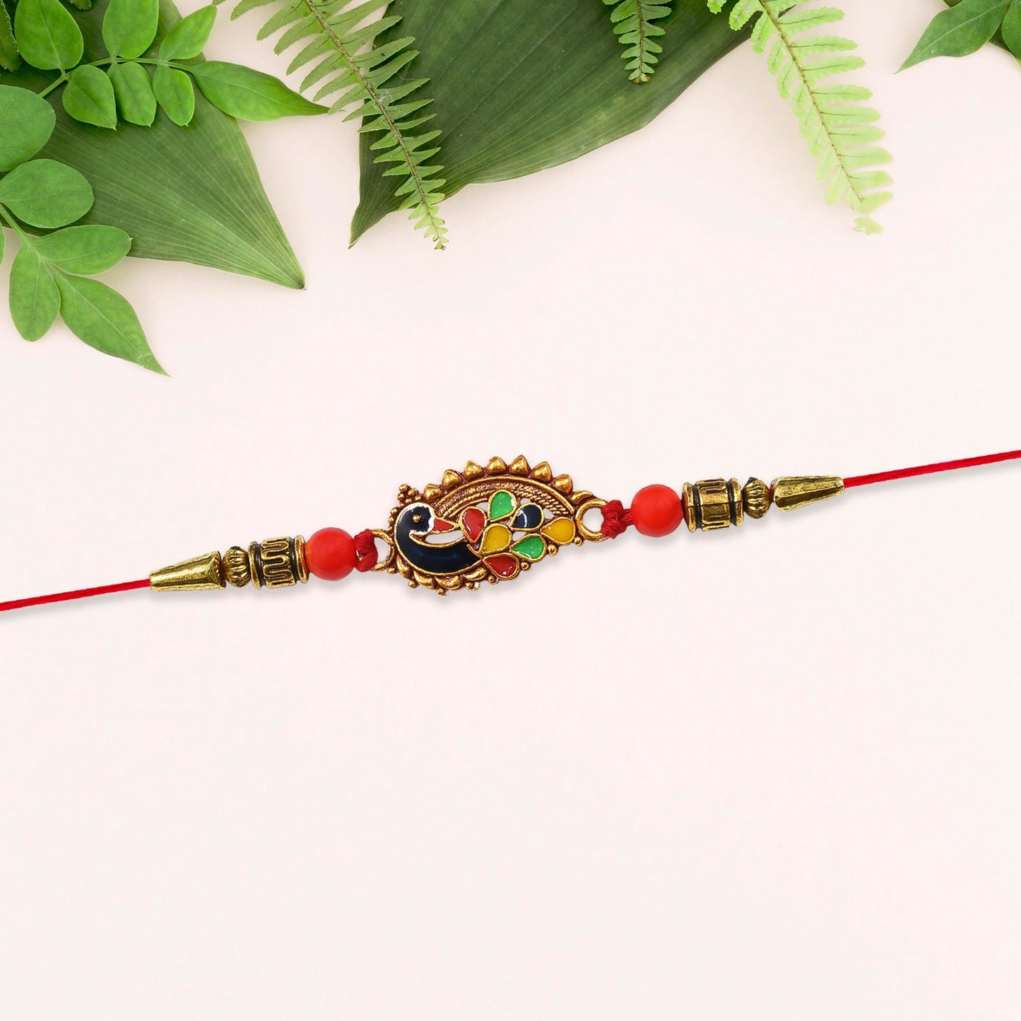 Stylish Rakhi with Gold-Toned Leaf Dial