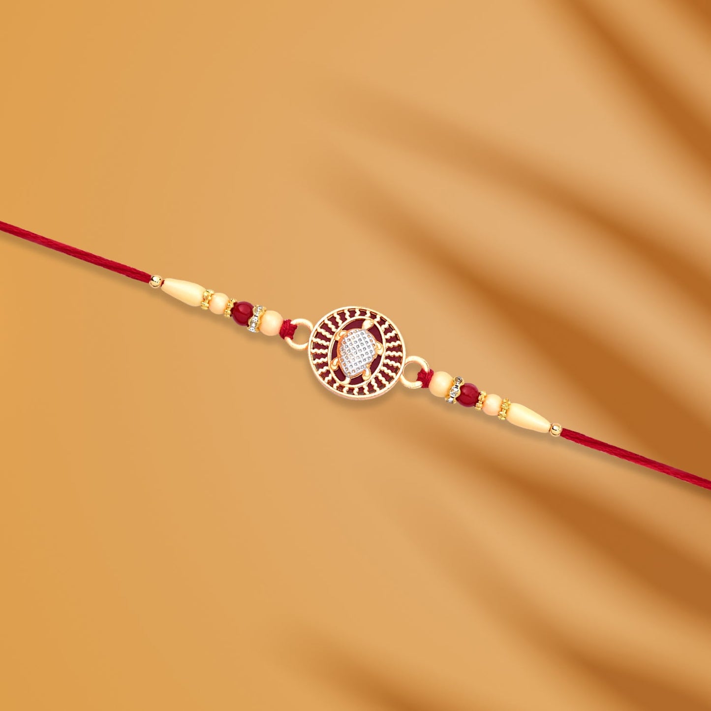 Designer Turtle Rakhi with Beaded Red Thread