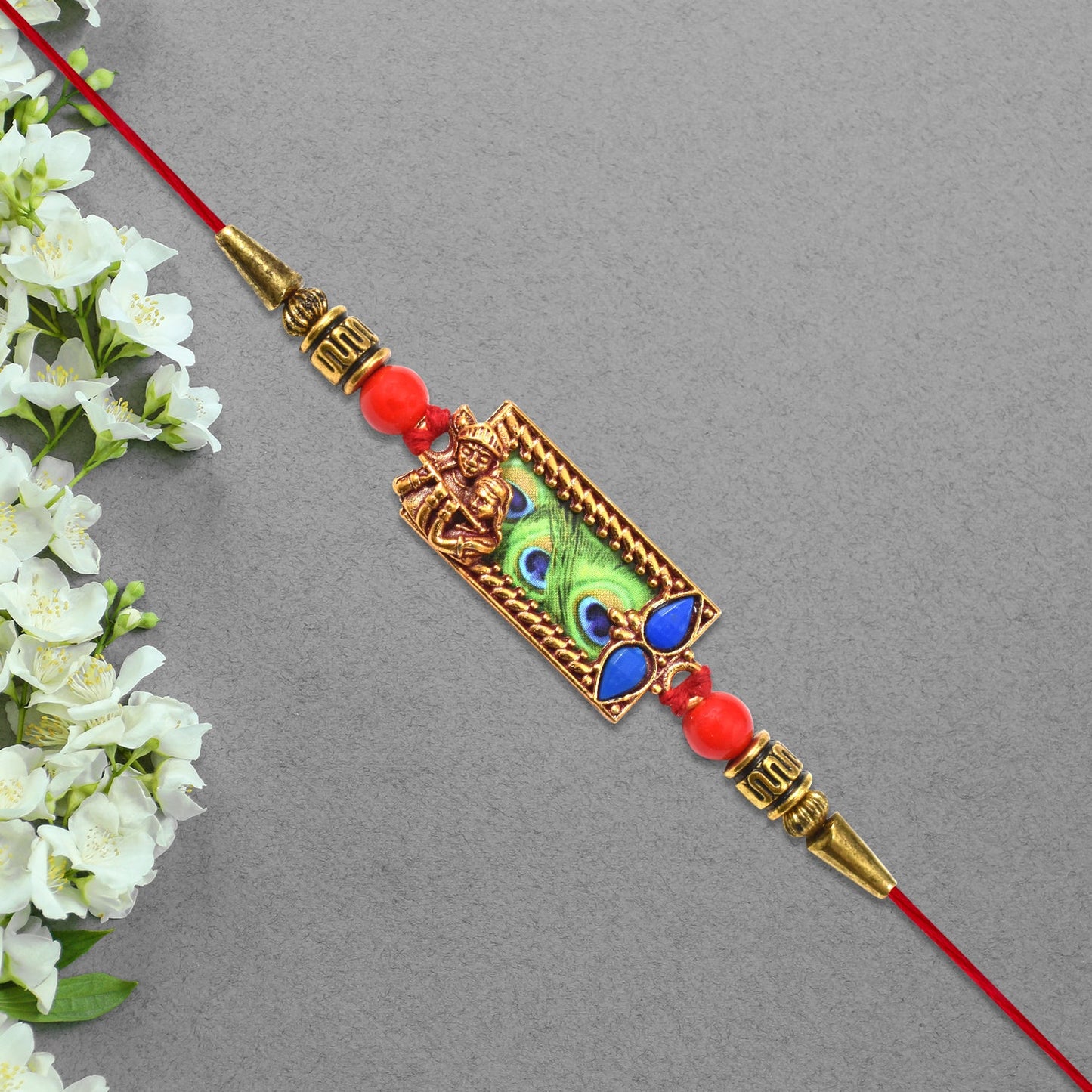 Krishna Rakhi with Peacock Feather Design