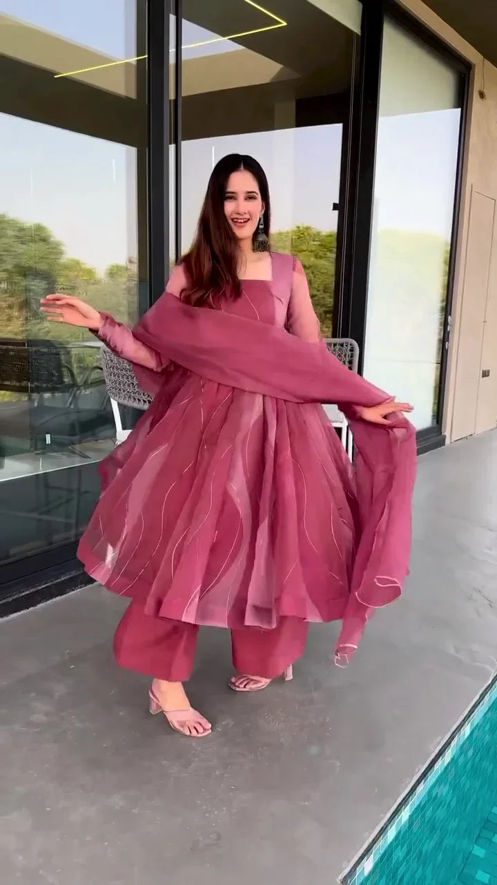 Mauve Pink Organza Anarkali Suit Set Featuring a Flowing Full-Flare Kurta with Intricate Sequin Thread Work, Matching Wide-Leg Trousers, and a Coordinating Dupatta, Ideal for Festive Occasions