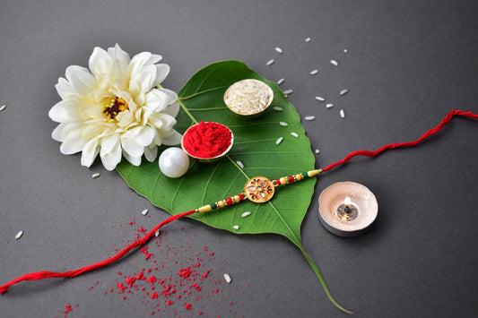 Sacred Kalash Design Rakhi with Embellished Beads and Red Thread