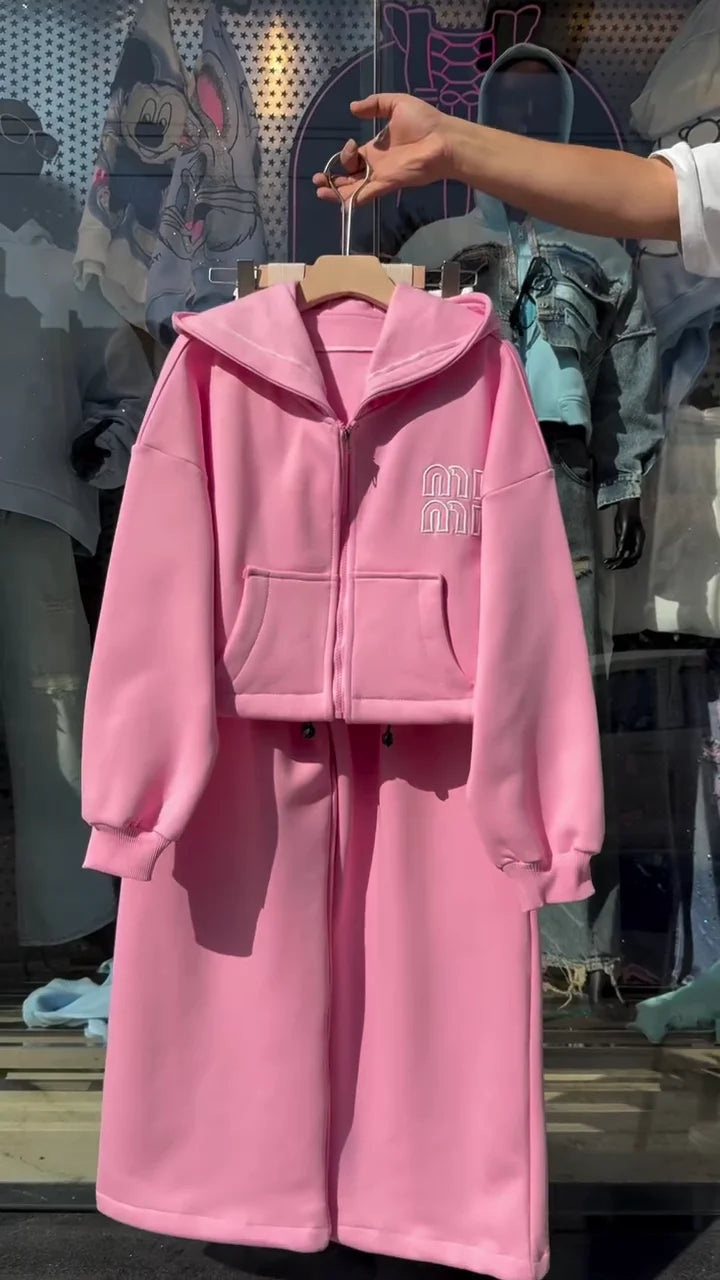 Trendy Women's Oversized Pink Denim Look Jacket: Stylish Ombre Dip-Dye Design with Raised White Bubble Text Graphic on the Back for a Statement Look