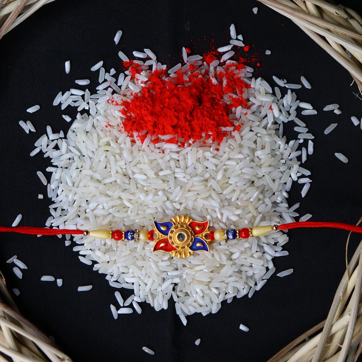 Designer Sun Motif Rakhi with Red and Blue Enamel Work