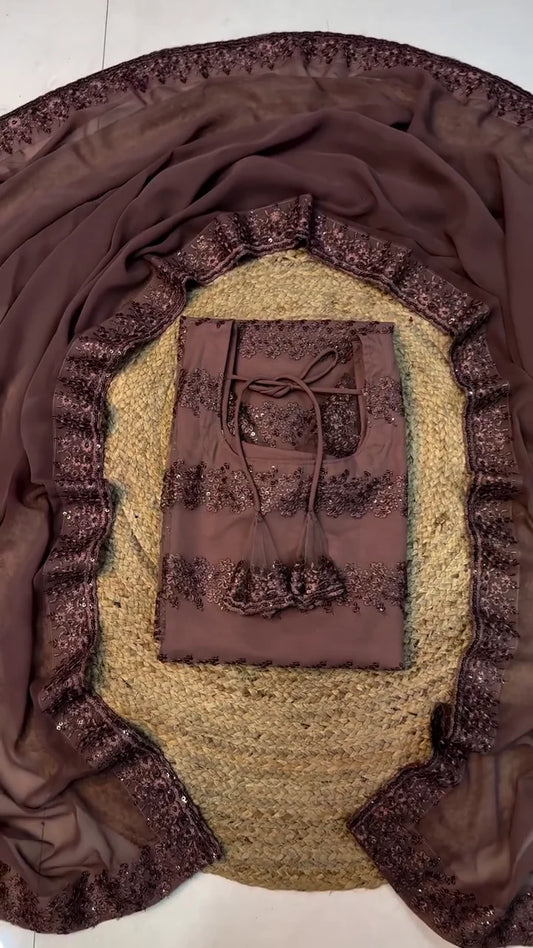 Luxurious Ensemble Featuring a Heavily Embellished Brown/Mauve Sleeveless Blouse with Tassels and Intricate Horizontal Beadwork, Paired with a Matching Georgette Dupatta Accented by a Thick Scalloped Sequin Border