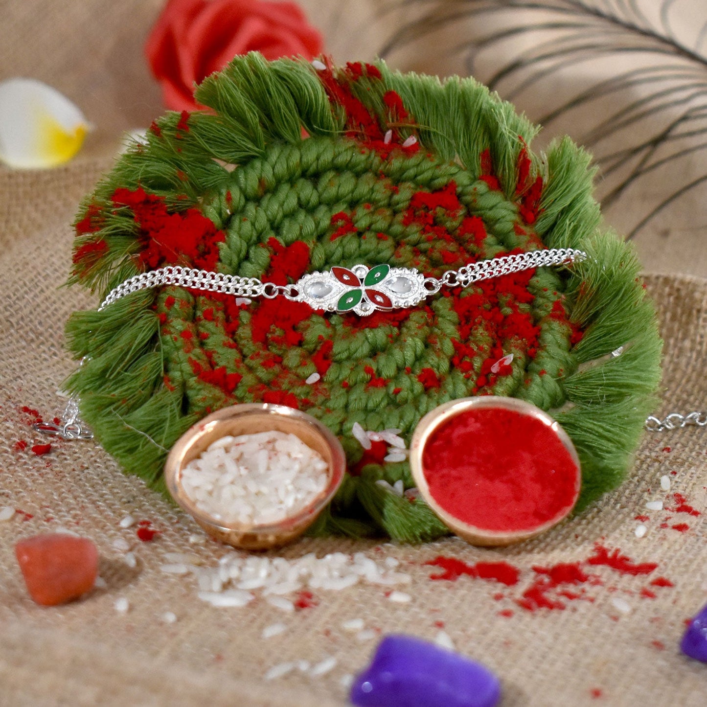 Elegant Floral Rakhi with Red-Green Enamel Work and Metal Chain