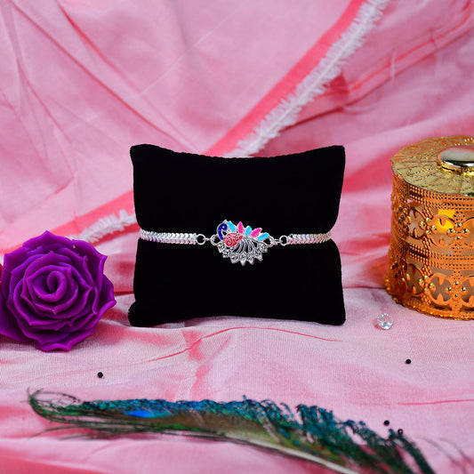 "Colorful Peacock Design Rakhi with Enamel Finish and Silver-Tone Metal Chain