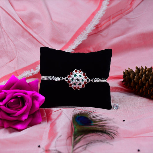 Round Shape Silver Chain Rakhi With  Red-Green Accents