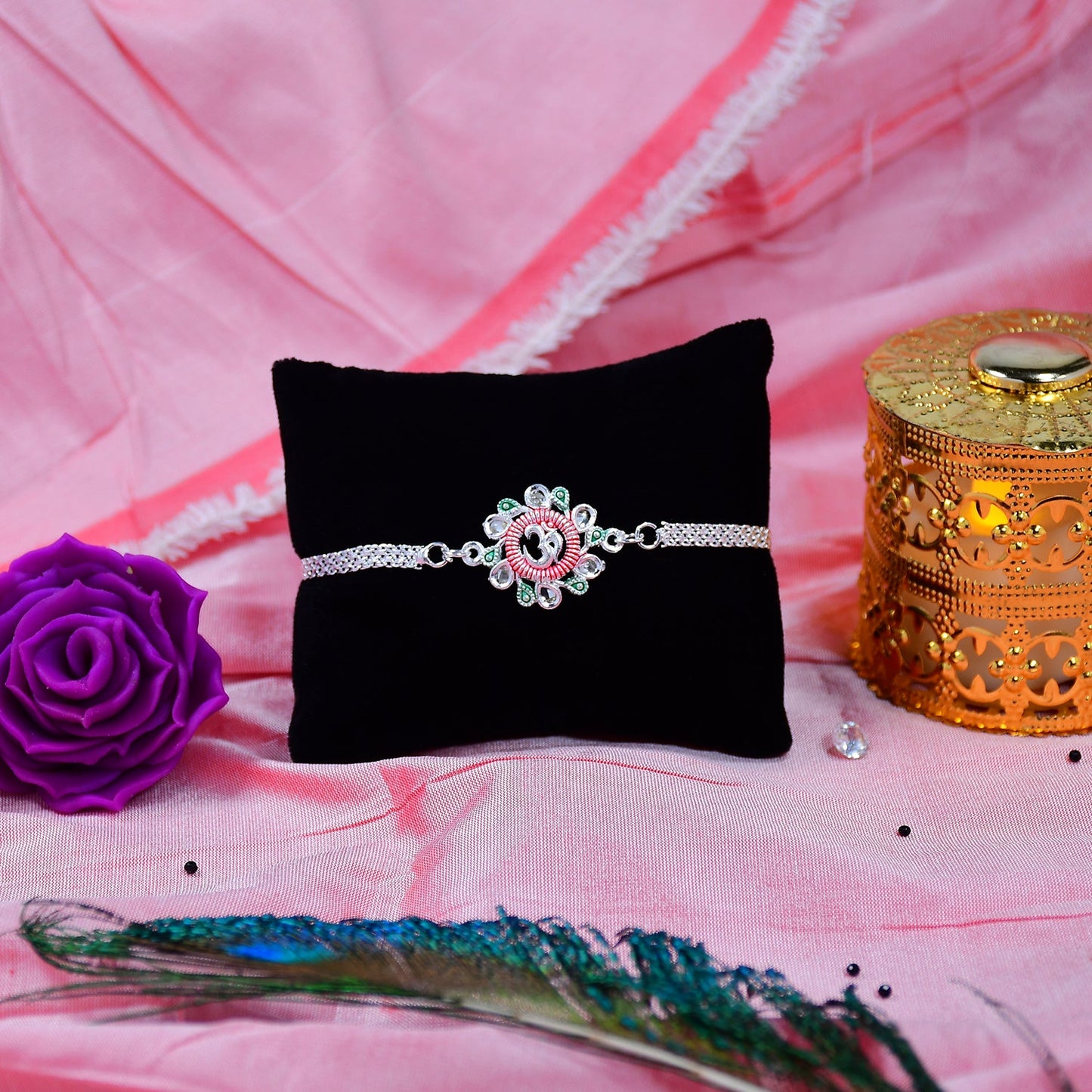 Elegant Floral Om Rakhi with Pink-Green Accents