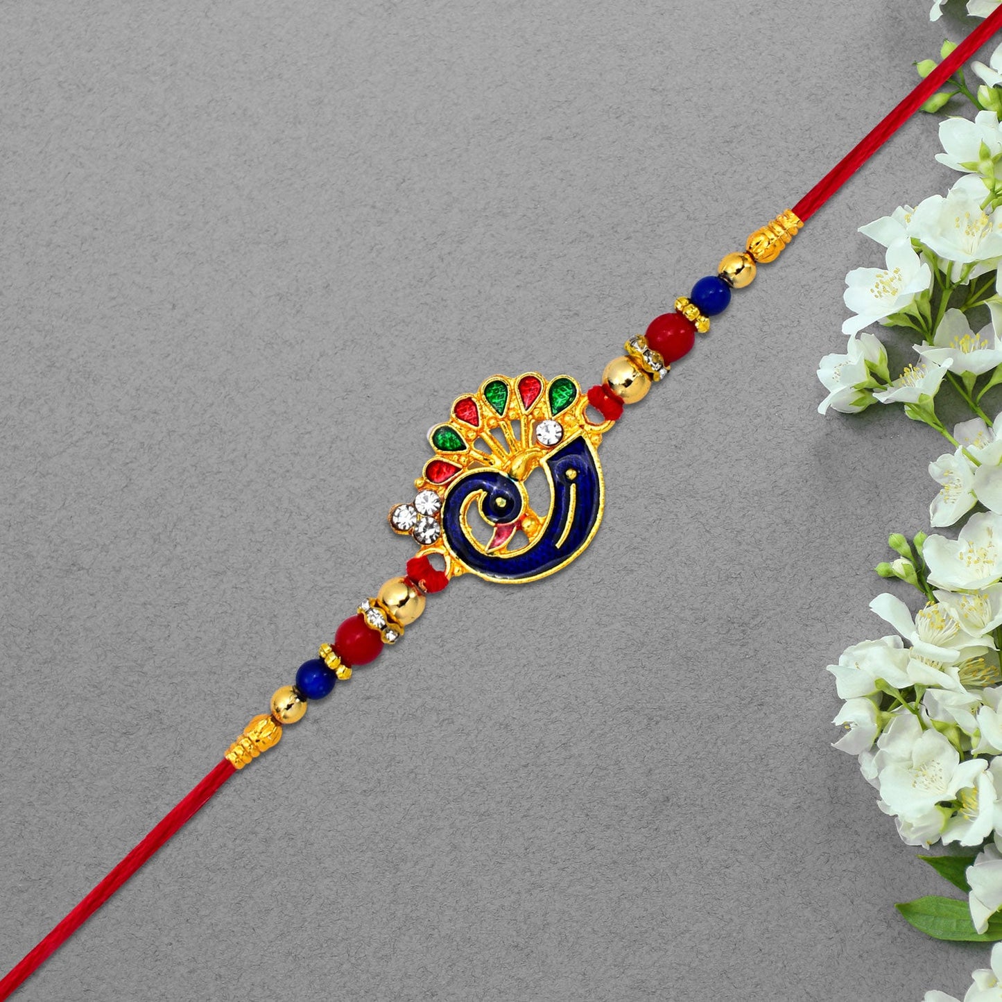 Peacock-Themed Designer Rakhi with Colorful Beads – Blue, Red & Gold Finish