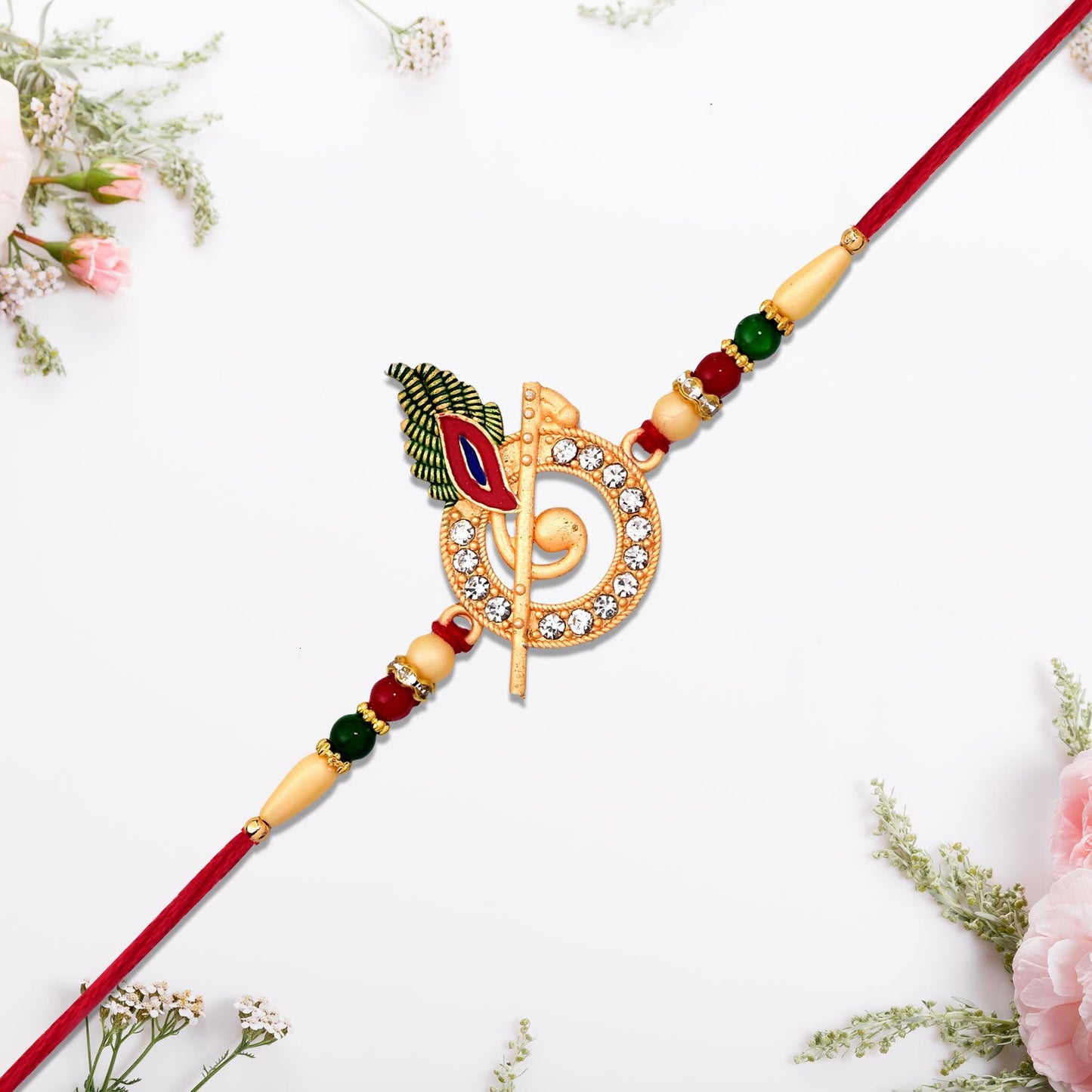 Krishna Flute Rakhi with Stone Studded Peacock Feather Design
