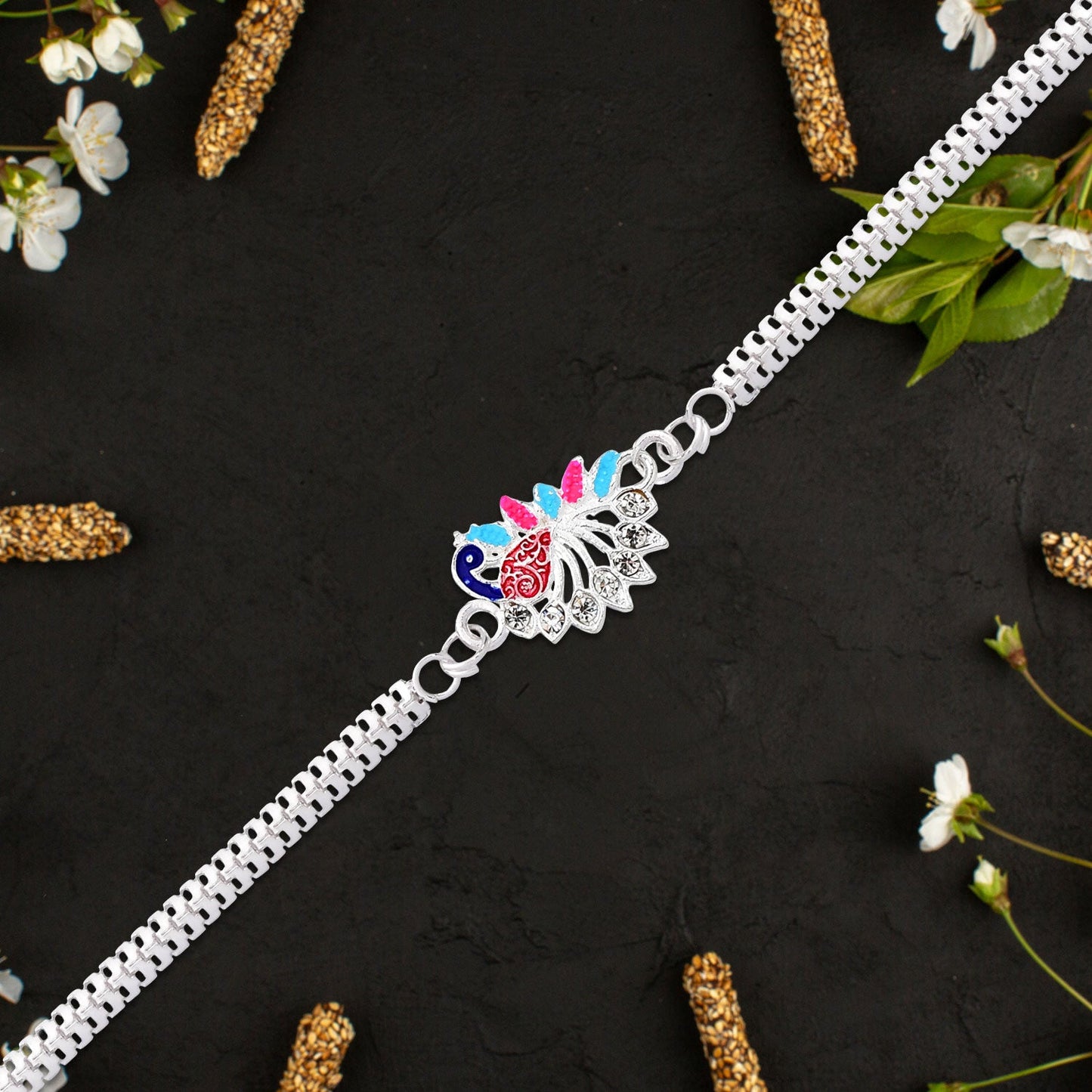 "Colorful Peacock Design Rakhi with Enamel Finish and Silver-Tone Metal Chain