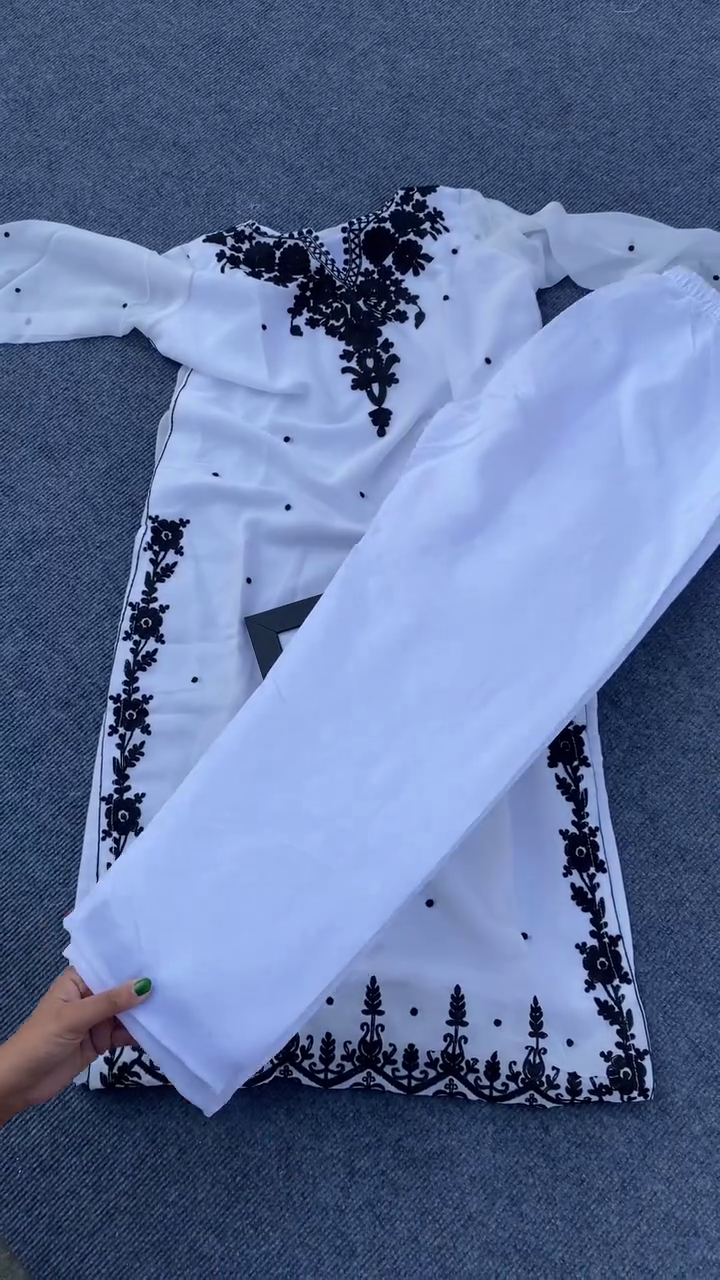 Elegant Black & White Embroidered Kurta Set – Women’s Traditional Ethnic Wear · White Shirt with Intricate Black Floral Embroidery