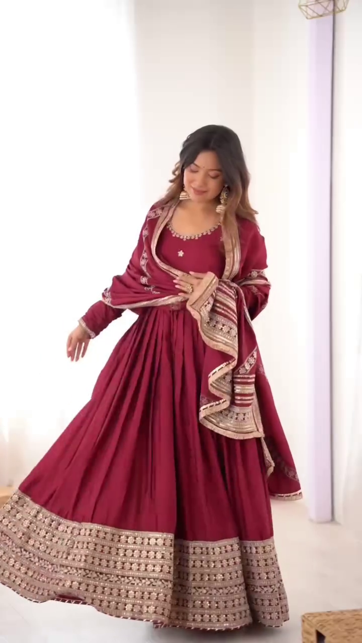 Exquisite Maroon Anarkali with Intricate Gold Embroidery and a Flowing Dupatta, Ideal for Festive and Traditional Occasions